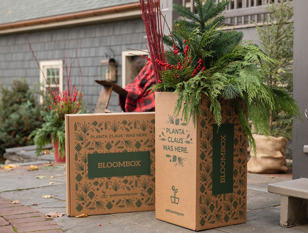 Bloombox holiday boxes on a porch